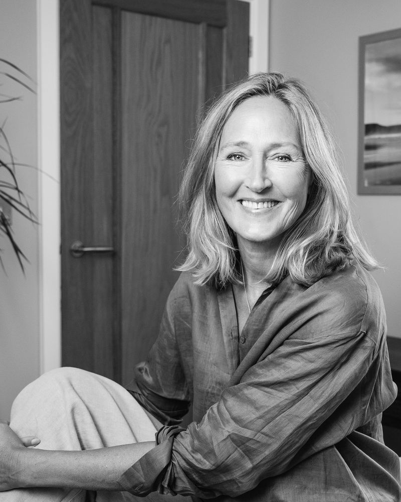 Jac Crow seated in her treatment room
